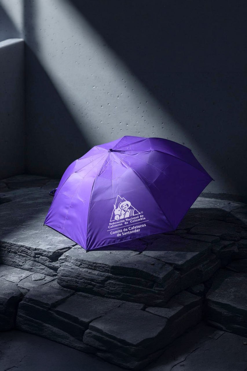 Sombrilla morada comité de cafeteros